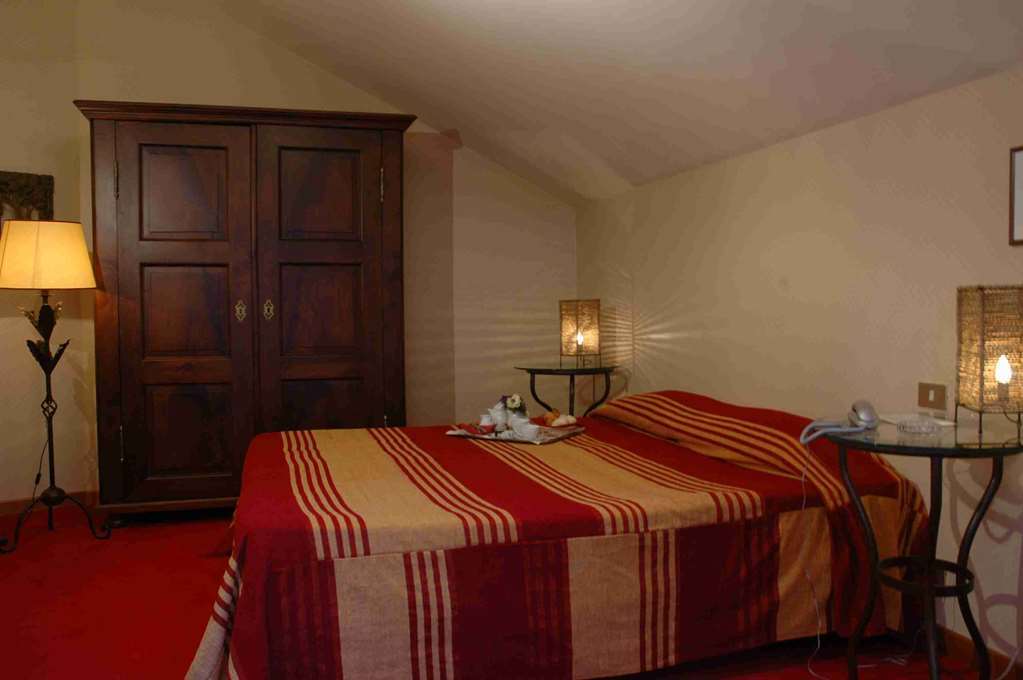 Hostellerie Du Golf Pecetto Zimmer foto