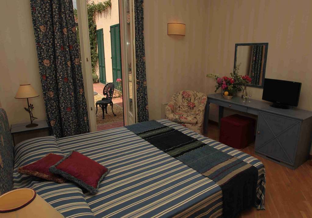 Hostellerie Du Golf Pecetto Zimmer foto